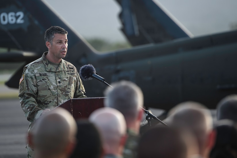 U.S. Army Lt. Col. Rich Tucker, 1st Battalion, 228th Aviation Regiment commander, speaks during a memorial service for U.S. Army Spc. Kyle Gantt at Soto Cano Air Base, Honduras, July 24, 2016. After the invocation, Tucker was the first who spoke about the life and service of Gantt, and the effect his passing has had and will have on the many people who were fortunate to have known Gantt. (U.S. Air Force photo by Staff Sgt. Siuta B. Ika)