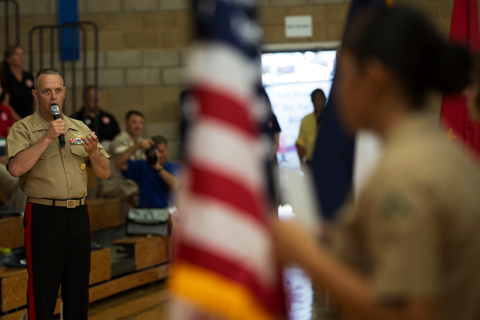 Brig. Gen. Kevin J. Killea, commanding general of Marine Corps Installations West and Marine Corps Base Camp Pendleton, delivers the opening remarks for the 2016 Conseil International Du Sport Militaire (CISM) World Military Women’s Basketball Championship tournament July 25 at Camp Pendleton, California. Camp Pendleton is hosting the CISM World Military Women’s Basketball Championship July 25 through July 29 to the opportunity for high-caliber U.S. service member athletes to be positively engaged with their peers from nations around the globe. (U.S. Marine Corps photo by Sgt. Abbey Perria)