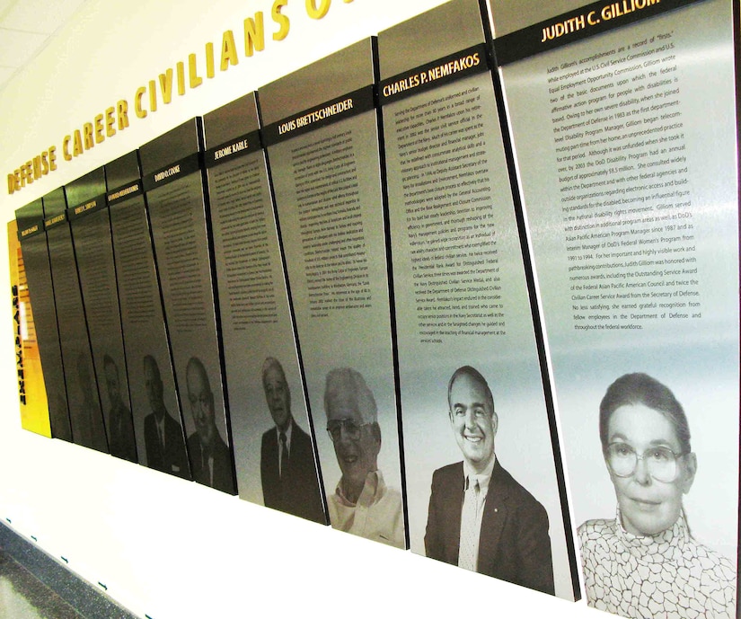 Judith C. Gilliom’s photo and story are featured along with those of several other distinguished Defense Department civilian employees at a wall-mounted display in the Pentagon. Gilliom, a noted advocate for disabled employees and workforce diversity, died Oct. 15, 2008. DoD photo by Gerry J. Gilmore