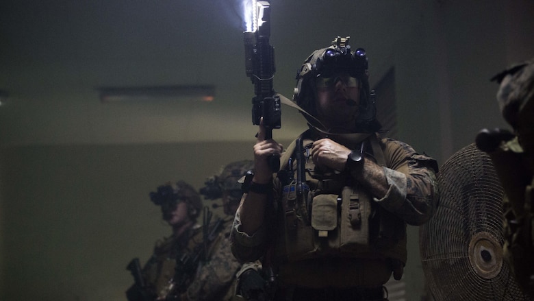 U.S. Marines with the Maritime Raid Force, 31st Marine Expeditionary Unit search rooms in the dark in a water treatment facility at Koror, Palau, July 21, 2016. The Marines are conducting training in Palau to ensure familiarity with Palau's complex urban environment. The training events were planned out with local authorities to provide an opportunity for realistic training with minimal inconvenience to the community and environment.