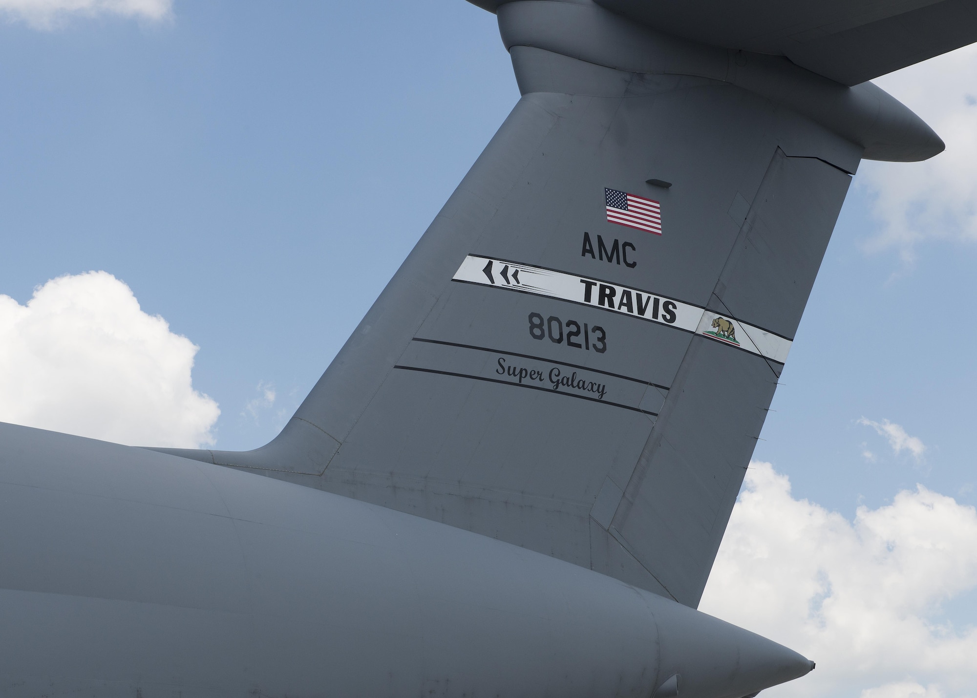 A C-5M Space Cargo Modified (SCM) Super Galaxy,  sits on the flight line July 21, 2016, at Dover Air Force Base, Del. This C-5 has just completed a Major Isochronal Inspection and is ready to return to its home station, Travis AFB, Calif. (U.S. Air Force photo/Senior Airman Zachary Cacicia)