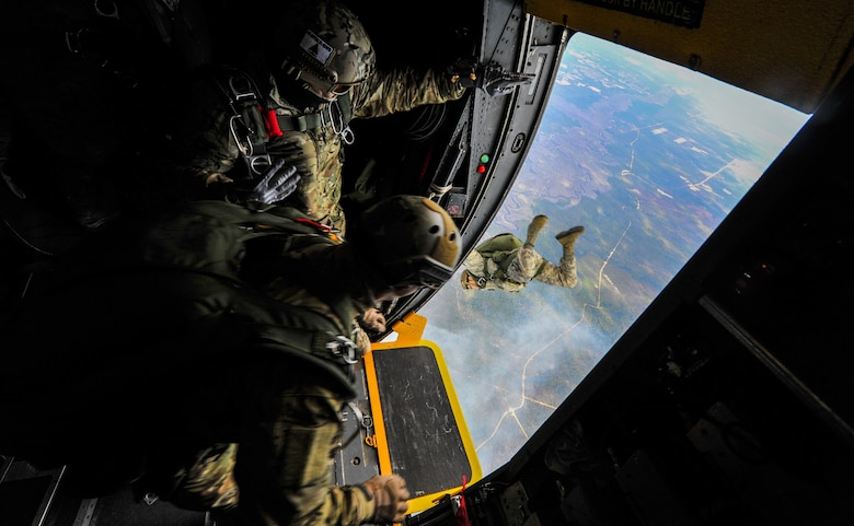 Special Tactics Airmen jump out of the door of a MC-130 Talon II  as an alternate insertion into hostile or austere environments, when aircraft cannot land in enemy territory or rough terrain. The Special Tactics Airmen train to land safely in a planned drop zone and conduct their mission, whether it be personnel recovery, airfield reconnaissance and establishment or special operations air integration. (U.S. Air Force photo by Staff Sgt. Christopher Callaway) 
