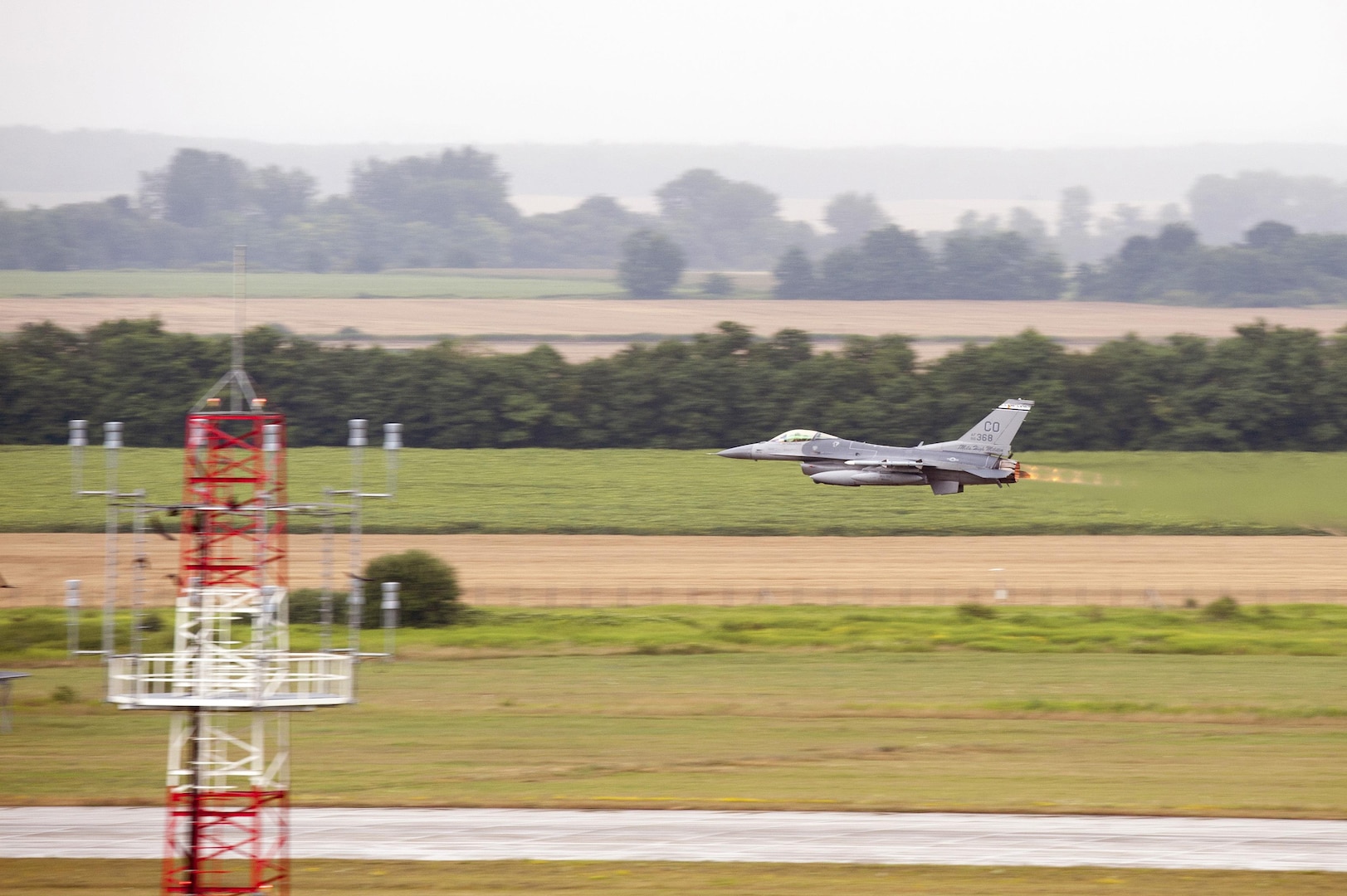 An F-16 Fighting Falcon from the 140th Wing, Colorado Air National Guard, Buckley Air Force Base, Colorado, performs a fly-by over Papa Air Base, Papa, Hungary.  In support of Operation Atlantic Resolve, the 140th Wing, Colorado Air National Guard from Buckley Air Force Base, Colorado, has deployed approximately 200 Airmen to Papa Air Base, Hungary, to conduct familiarization training alongside our NATO ally, Hungary. 