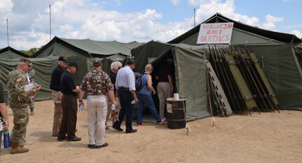 Army Reserve Ambassadors attending the 88th Regional Support Command’s Army Reserve Ambassador Workshop July 16, tour the 452nd Combat Support Hospital training site during the 86th Training Division’s WAREX taking place on Fort McCoy.