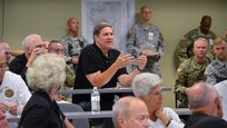 Steve Carter, Army Reserve Ambassador for the state of Minnesota, asks a question during the 88th Regional Support Command’s Army Reserve Ambassador Workshop on Fort McCoy, July 15. The workshop provided the ambassadors information on the current and future structure of the Army Reserve, how the Army Reserve fits into overall Army readiness and what the ambassadors can do to assist Soldiers in their states. Speakers included Army Reserve leadership, general officers with units in the 88th RSC’s 19-state region, as well as Fort McCoy garrison command staff, 86th Training Division command staff and 88th RSC command staff.