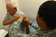 U.S. Air Force Senior Airman Tamika Bradley, 20th Medical Operations Squadron allergy and immunizations technician, cleans a patient’s skin before administering a vaccine at Shaw Air Force Base, S.C., July 20, 2016. Although Defense Department employees require regular vaccinations, some individuals cannot receive vaccines due to a weakened immune system. (U.S. Air Force photo by Airman 1st Class Destinee Dougherty)