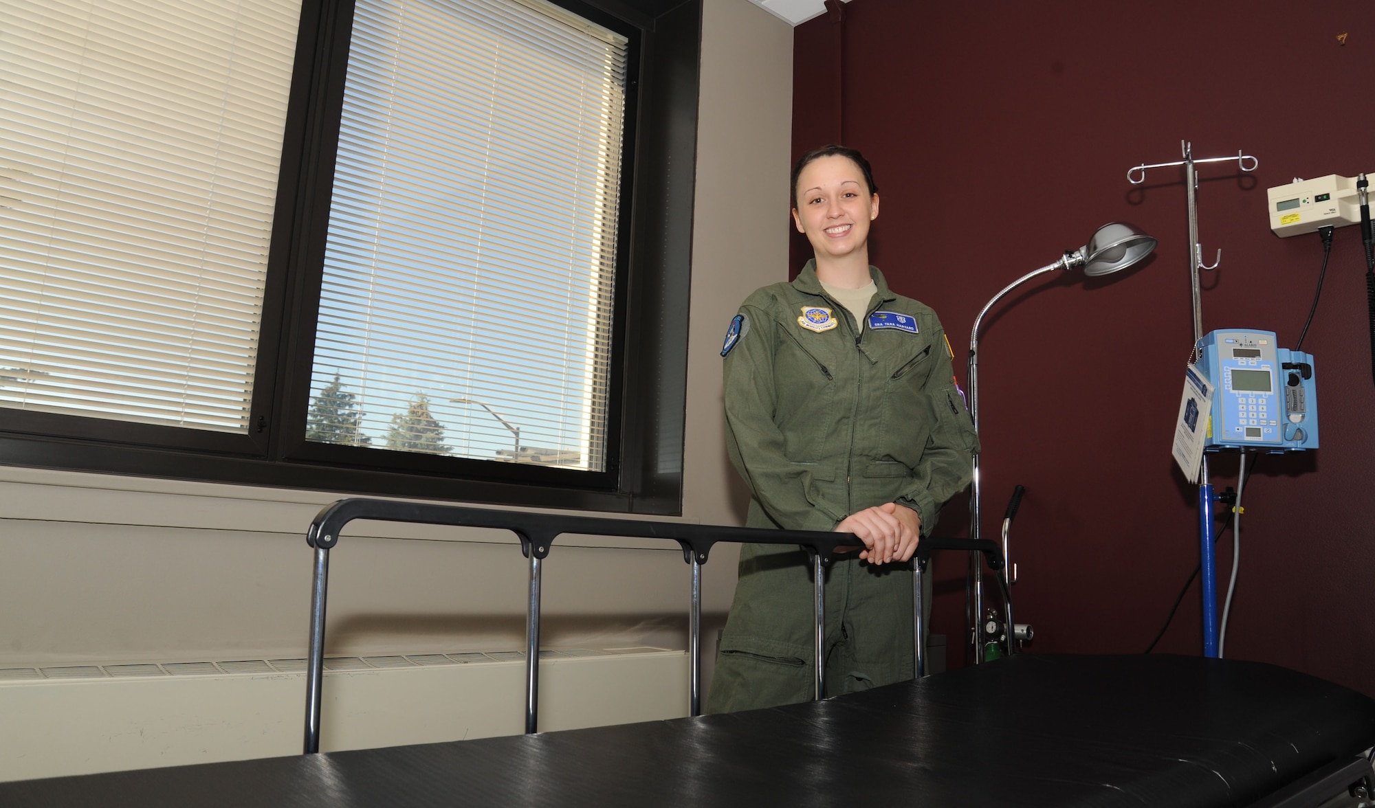 Senior Airman Tara Harvard, 92nd Aerospace Medicine Squadron flight and operational medical technician, poses for a photo in a patient ward at the 92nd Medical Group clinic at Fairchild Air Force Base, Wash., June 28, 2016. Harvard completed flight medic school at Wright-Patterson AFB, Ohio in May. (U.S. Air Force photo/Senior Airman Sam Fogleman)