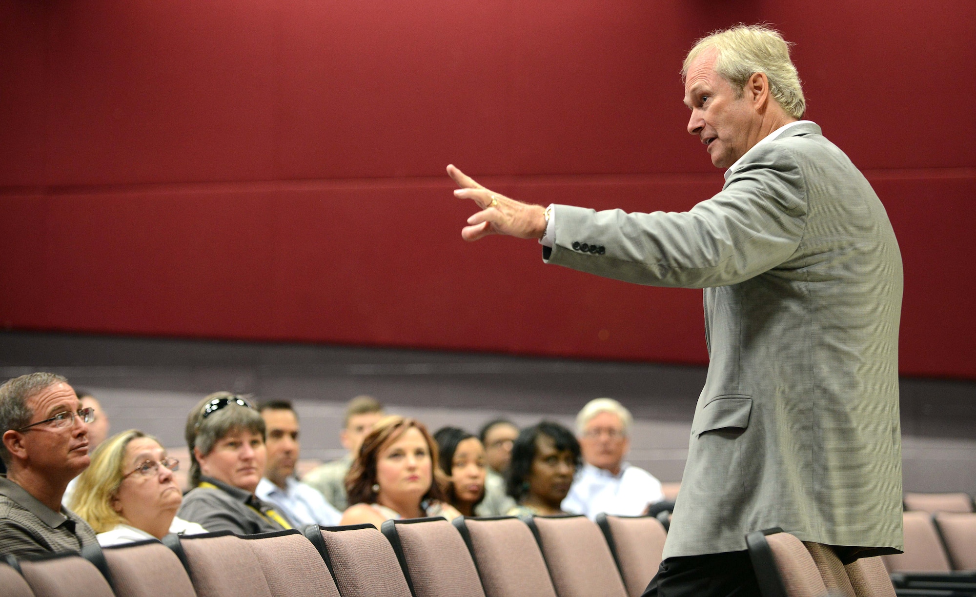 Dan Clark, world-renowned motivational speaker and New York Times best-selling author of “Chicken Soup for the Soul” and “The Art of Significance,” speaks at one of three sessions in the Base Theater July 14. (U.S. Air Force photo by Tommie Horton)