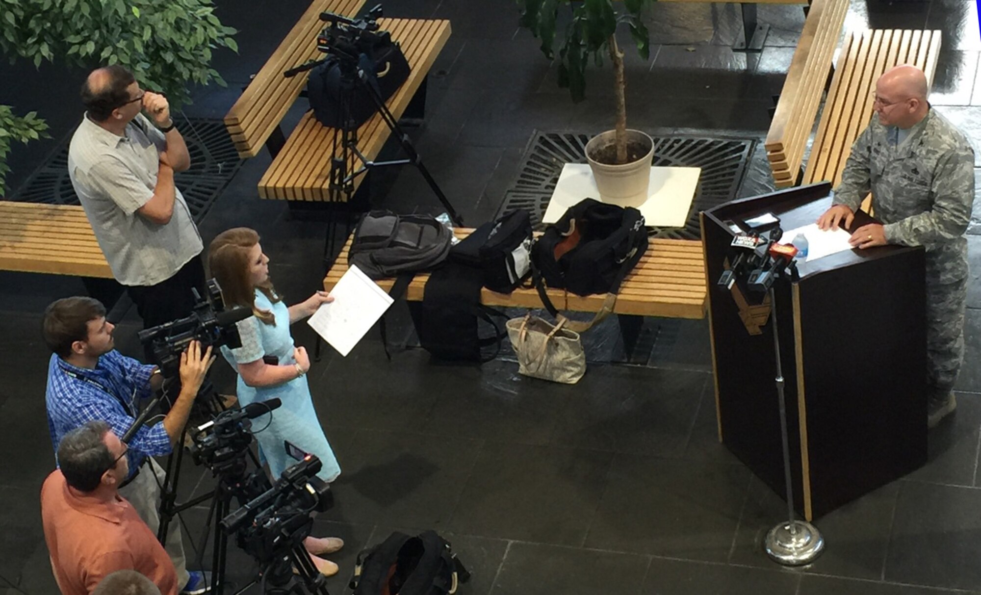 Col. Jeff King, 78th Air Base Wing commander, meets with local media in the Bldg. 905 atrium to discuss the state of the base, the events of the last year and things ahead. (U.S. Air Force photo by Roland Leach)