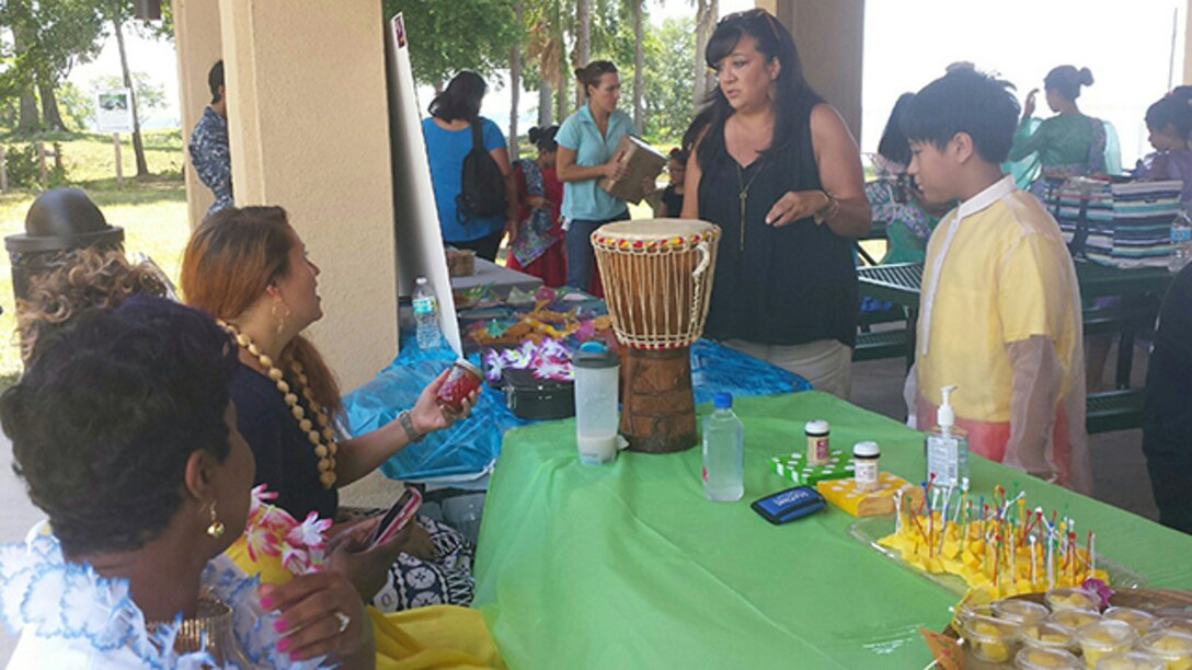 Several employees from DLA Aviation at Jacksonville, Florida participated in the 8th annual Multicultural Fun Day July 14, 2016 at Naval Air Station Jacksonville. The group represented Hawaiian culture and set up a display with traditional Hawaiian history, musical instruments and food.  