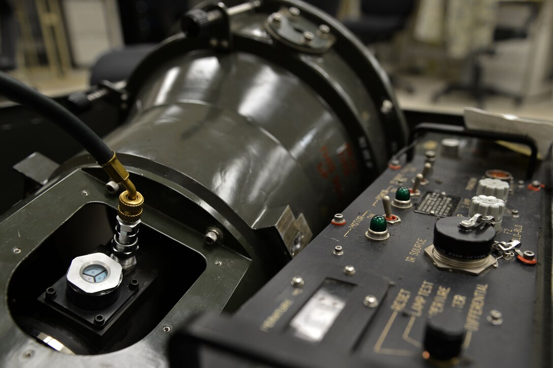 An infrared target simulator at the precision measurement equipment laboratory on Shaw Air Force Base, S.C., July 21, 2016. An infrared target simulator is re-calibrated by PMEL Airmen so it can accurately track a thermal image when mounted onto aircraft. (U.S. Air Force photo by Airman 1st Class Christopher Maldonado)