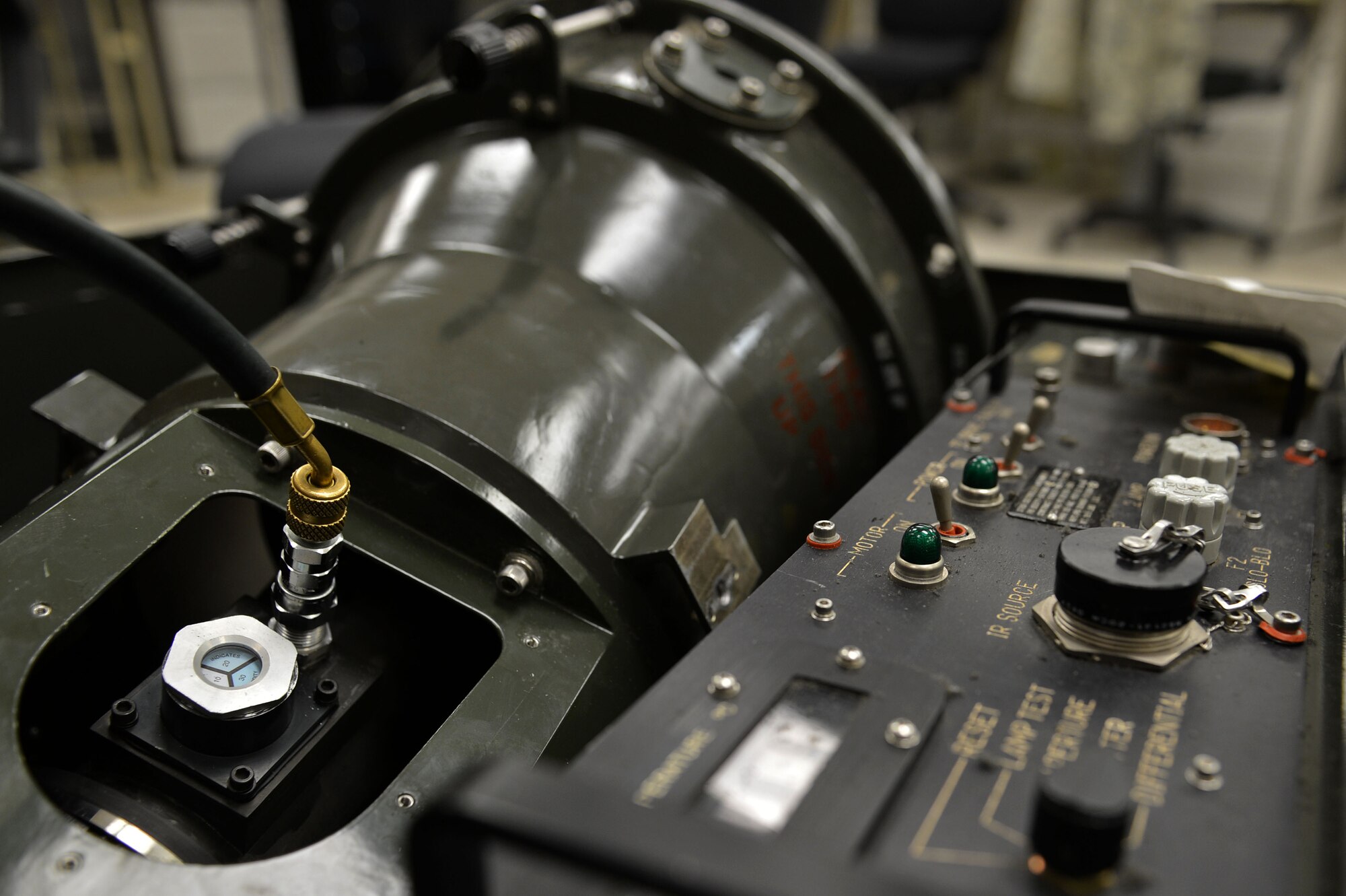 An infrared target simulator at the precision measurement equipment laboratory on Shaw Air Force Base, S.C., July 21, 2016. An infrared target simulator is re-calibrated by PMEL Airmen so it can accurately track a thermal image when mounted onto aircraft. (U.S. Air Force photo by Airman 1st Class Christopher Maldonado)