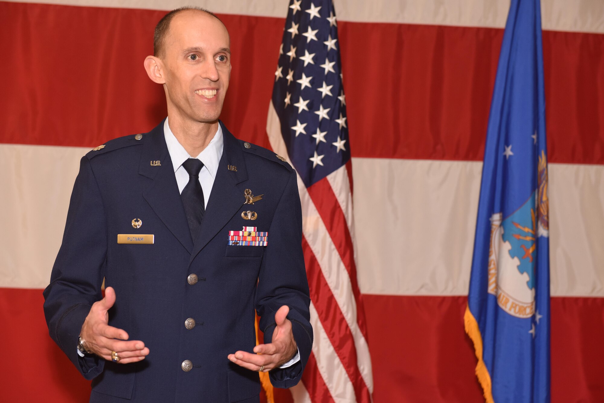 Lt. Col. Scott Putnam, 18th Space Control Squadron commander, addresses members in attendance during an assumption of command ceremony, July 22, 2016, Vandenberg Air Force Base, Calif. Putnam assumed command of the 18th SPCS, the newest space surveillance unit that will fall under the 21st Space Wing. (U.S. Air Force photo by Airman 1st Class Robert J. Volio)