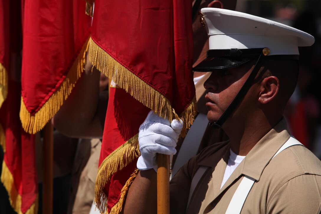 Sgt. Antonio Garay, a field radio operator and color sergeant with 3rd Marine Division, comes to a halt at the end of Guam’s Liberation Day Parade July 21, 2016. This is the first time since 1944 that the color guard has marched in the Liberation Day Parade. The legacy between past and present Marines and Sailors of 3rd Marine Division lives on through events such as the annual Liberation Day Parade. Garay is from Tuscon, Arizona.