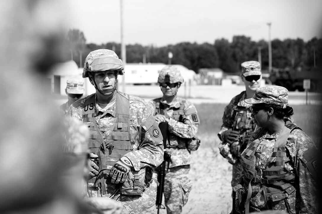 Col. Robert Cooley, deputy commander of the 85th Support Command, meets with soldiers assigned to the 314th Chemical Company, Decatur, Georgia, at forward operating (training) base Liberty, Fort McCoy, Wisconsin, July 11, 2016.
(U.S. Army photo by Mr. Anthony L. Taylor/Released)