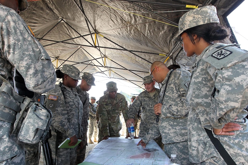 Observer-coach/trainers observe as soldiers assigned to the 371st Chemical Company, Greenwood, South Carolina, conduct a plan for a fragmentary order that they just received to perform reconnaissance on an area, and determine if they need to conduct decontamination. The exercise will include the staff putting together a plan to begin their troop leading procedures and prepare a FRAGO to their soldiers, July 11, 2016.
(U.S. Army photo by Mr. Anthony L. Taylor/Released)