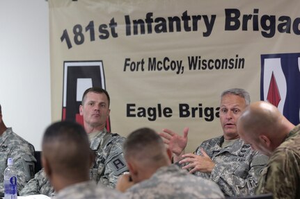 Col. John Cook, left, Commander, 181st Infantry Brigade, listens as Col. Robert Cooley, deputy commander for the 85th Support Command, gives remarks during a battle update brief at the 181 INF BDE headquarters, July 11, 2016, at Warrior Exercise 86-16-03, Fort McCoy, Wisconsin.
(U.S. Army photo by Mr. Anthony L. Taylor/Released)