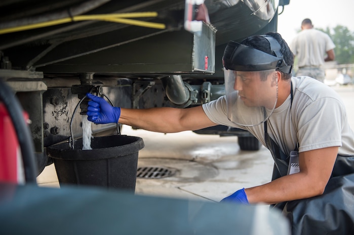 Airman 1st Class Robert Mitchell, 628th Logistic Readiness Squadron fuel distribution operator, opens a fuel valve on an R11 refueler, July 18, 2016, at Joint Base Charleston, S.C. Last year, over 50 Airmen of the 628th LRS fuels flight provided the base with more than 36 million gallons of fuel for missions  throughout the base. (U.S. Air Force photo/Staff Sgt. Jared Trimarchi)