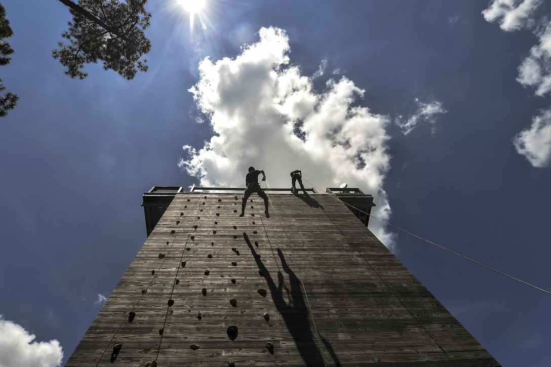 Junior ROTC cadets rappel down a 40-foot tower at Hurlburt Field, Fla., July 20, 2016. Special tactics airmen worked with 60 cadets from five high schools during a weeklong summer leadership course. Air Force photo by Senior Airman Ryan Conroy