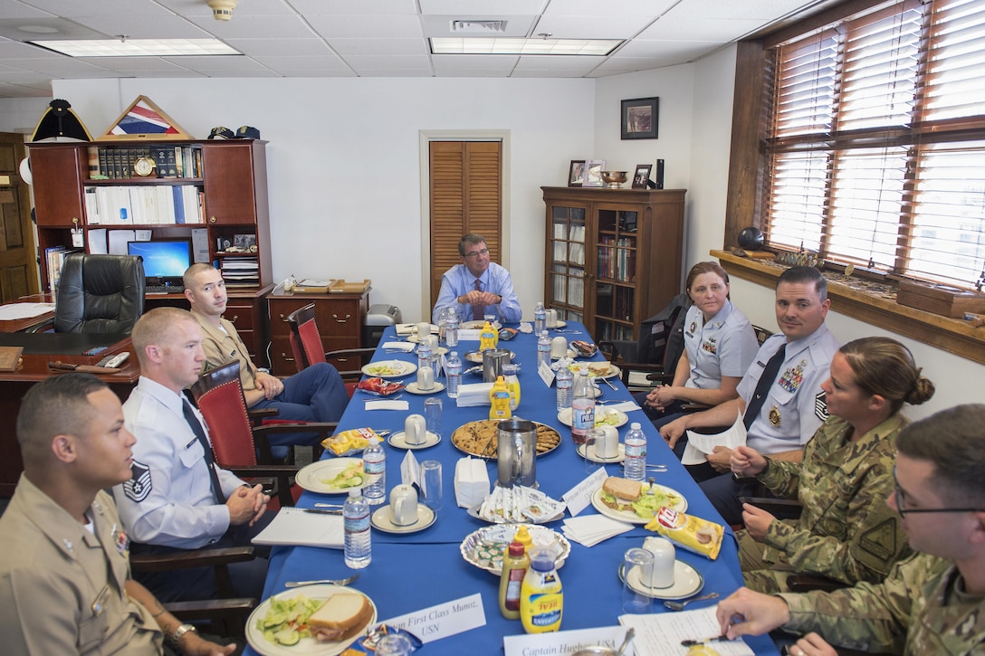 Defense Secretary Ash Carter, center, meets with military recruiters to talk about recruiting challenges during a visit to Boston, July 26, 2016. DoD photo by Air Force Tech. Sgt. Brigitte N. Brantley