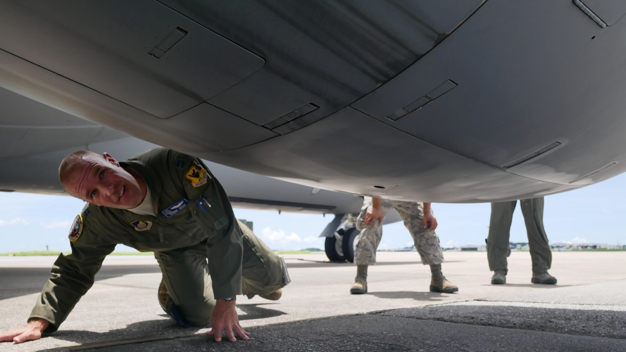 U.S. Air Force Capt. Thomas Weber, 909th Air Refueling Squadron pilot, conducts a pre-flight inspection of a KC-135R Stratotanker June 30, 2016 at Kadena Air Base, Japan. The Stratotanker has been the Air Force’s core aerial refueling airframe for more than 50 years. (U.S. Air Force photo by Senior Airman John Linzmeier)