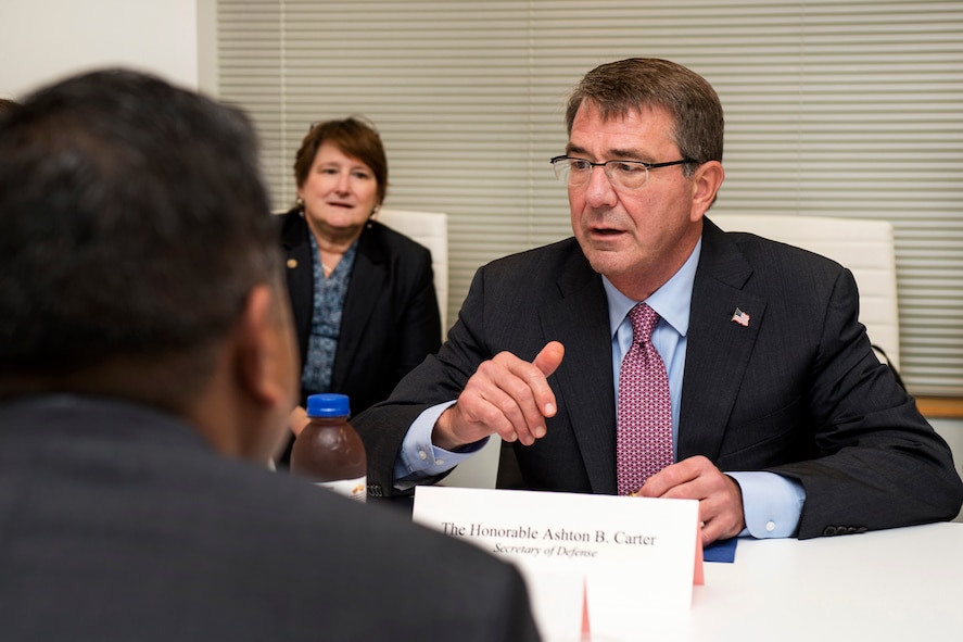 Defense Secretary Ash Carter talks to attendees during a meeting at the new Defense Innovation Unit Experimental.