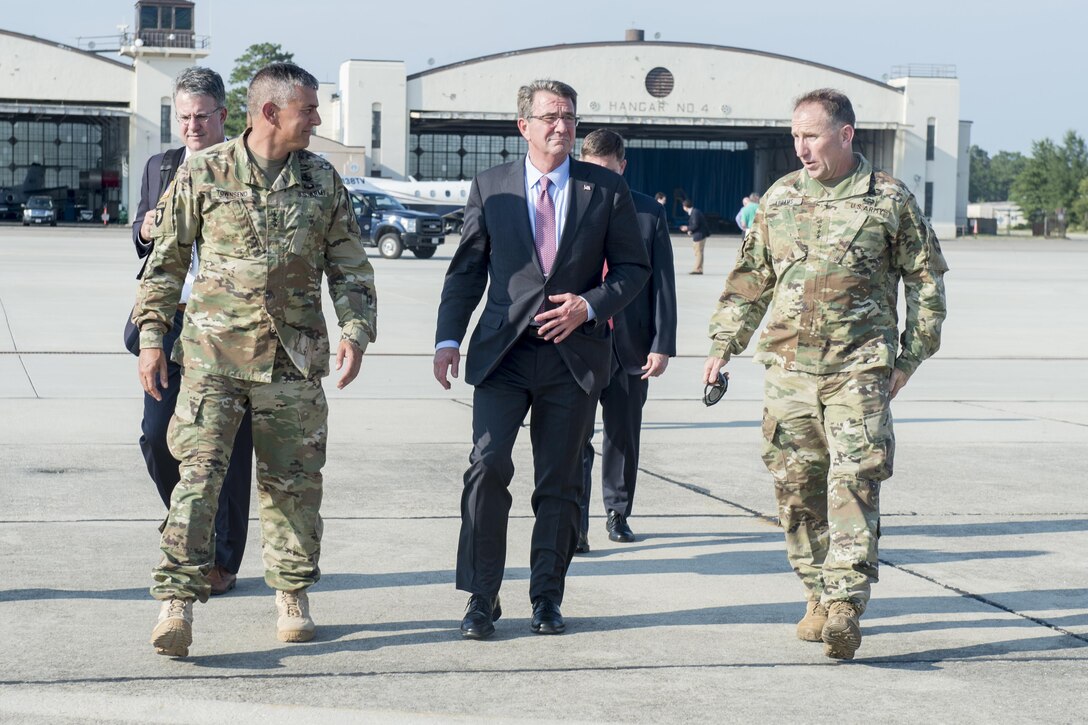 Defense Secretary Ash Carter, center,  meets with Army Lt. Gen. Stephen Townsend, left, XVIII Airborne Corps commanding general, and Army Gen. Robert Abrams, right, U.S. Army Forces Command commander, upon arriving at Fort Bragg, N.C., July 26, 2016. DoD photo by Air Force Tech. Sgt. Brigitte N. Brantley