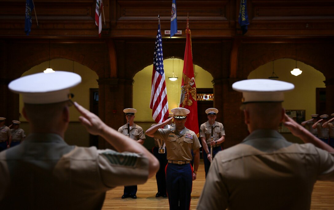 U.S. Marine Corps Maj. Christopher Kaprielian receives the order to deactivate Recruiting Station Buffalo at the New York State Armory in Buffalo, N.Y., July 26, 2016. RS Buffalo was closed after more than 30 years of successfully finding and preparing young men and women to become Marines. (U.S. Marine Corps photo by Sgt. Elizabeth Thurston)