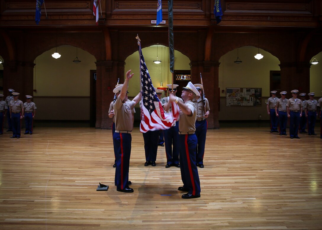 The commanding officer and Sgt. Maj. of Recruiting Station Buffalo case the colors at the New York State Armory in Buffalo, N.Y., July 26, 2016. RS Buffalo was closed after more than 30 years of successfully finding and preparing young men and women to become Marines. (U.S. Marine Corps photo by Sgt. Elizabeth Thurston)