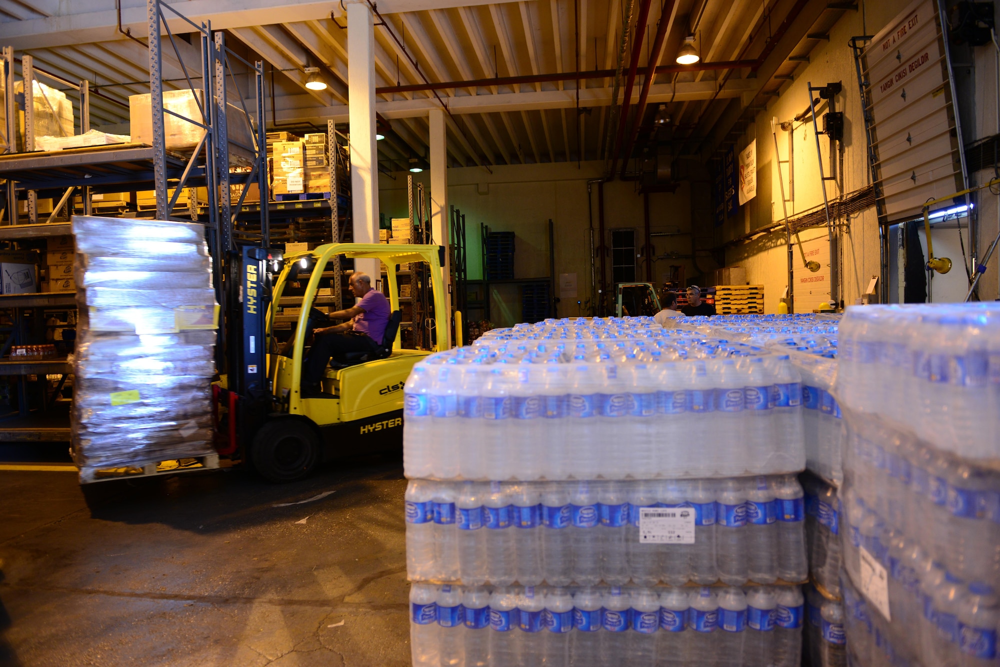 A commissary employee unloads goods from a truck July 20, 2016, at Incirlik Air Base, Turkey. The Defense Commissary Agency provides goods to personnel at most base locations across the Department of Defense. (U.S. Air Force photo by Tech. Sgt. Caleb Pierce)