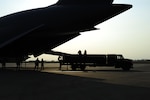 Airmen assigned to the 39th Logistics Readiness Squadron, unload fuel from a U.S. Air Force C-5M Super Galaxy July 22, 2016, at Incirlik Air Base, Turkey. Due to an extended loss of commercial power to the base, supplies, including food, water and fuel were delivered to sustain missions here at Incirlik. (U.S. Air Force photo by Airman 1st Class Devin M. Rumbaugh)