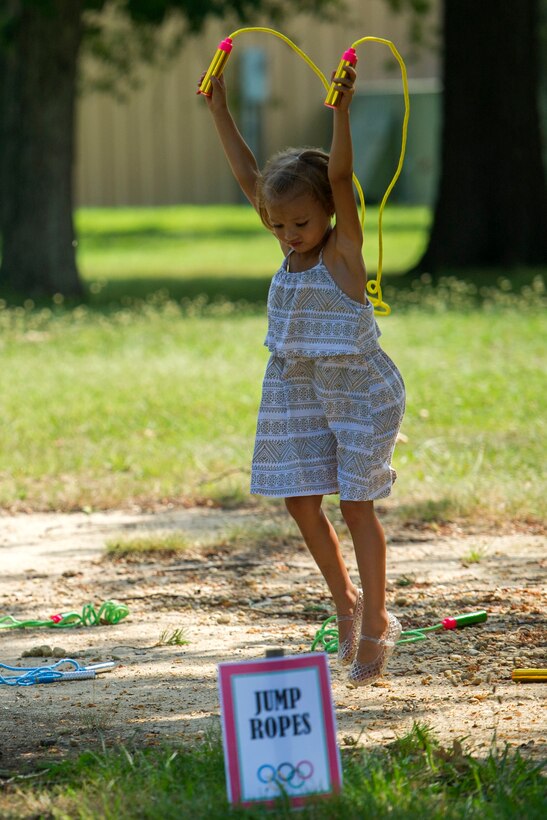 Kennedy, a child of a military member, jumps rope during the Joint Base Andrews Library field day held on JBA, Md., July 22, 2016. The event was part of the Department of Defense-Morale, Welfare and Recreation 2016 Summer Reading Program “Read for the Win,” a concept encouraging children to read during the summer months. (U.S. Air Force photo by Airman Gabrielle Spalding)