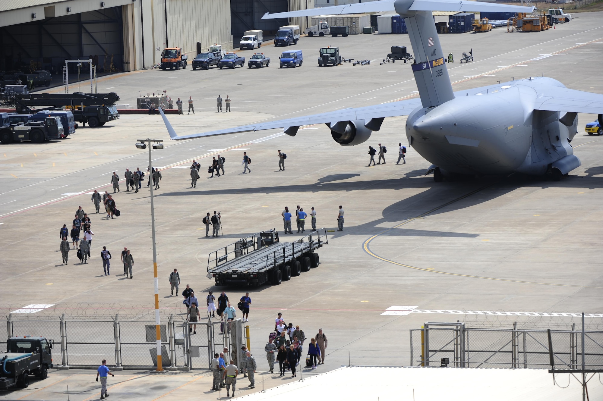 U.S. Air Force Airmen exit a U.S. Air Force C-17 Globemaster III July 22, 2016, at Incirlik Air Base, Turkey. Due to an extended loss of commercial power to the base, supplies, including food, water and fuel were delivered to sustain missions here at Incirlik. (U.S. Air Force photo by Airman 1st Class Devin M. Rumbaugh)