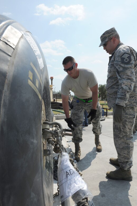 Airmen assigned to the 39th Logistics Readiness Squadron petroleum oils and lubricants flight, unload fuel from bladders into bulk storage July 22, 2016, at Incirlik Air Base Turkey. Due to an extended loss of commercial power to the base, supplies, including food, water and fuel were delivered to sustain missions here at Incirlik. (U.S. Air Force photo by Staff Sgt. Jack Sanders)