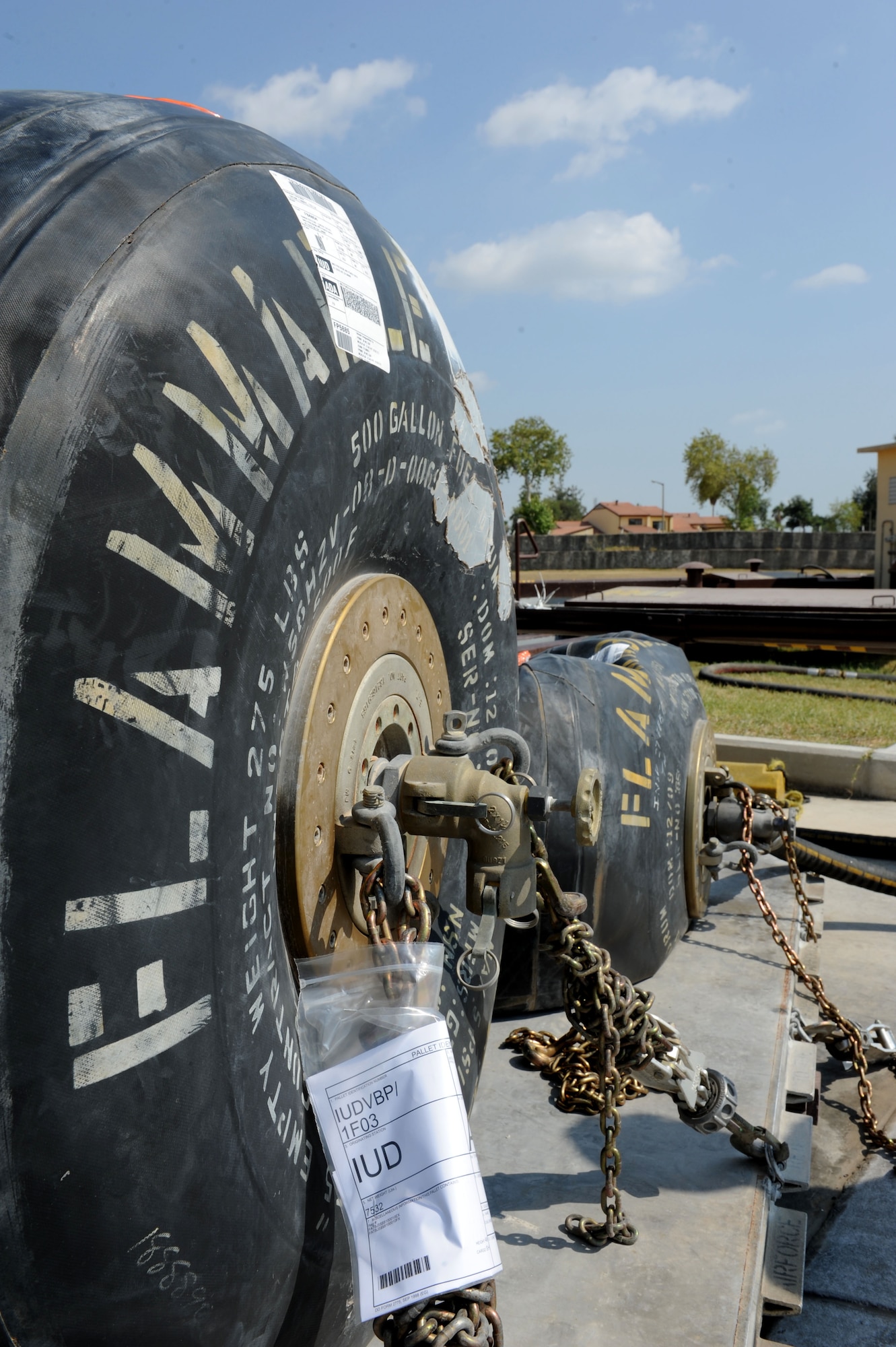 Resupply fuel bladders sit at the 39th Logistics Readiness Squadron petroleum oils and lubricants fuel yard before being unloaded into internal storage July 22, 2016, at Incirlik Air Base, Turkey. Due to an extended loss of commercial power to the base, supplies, including food, water and fuel were delivered to sustain missions here at Incirlik. (U.S. Air Force photo by Staff Sgt. Jack Sanders)