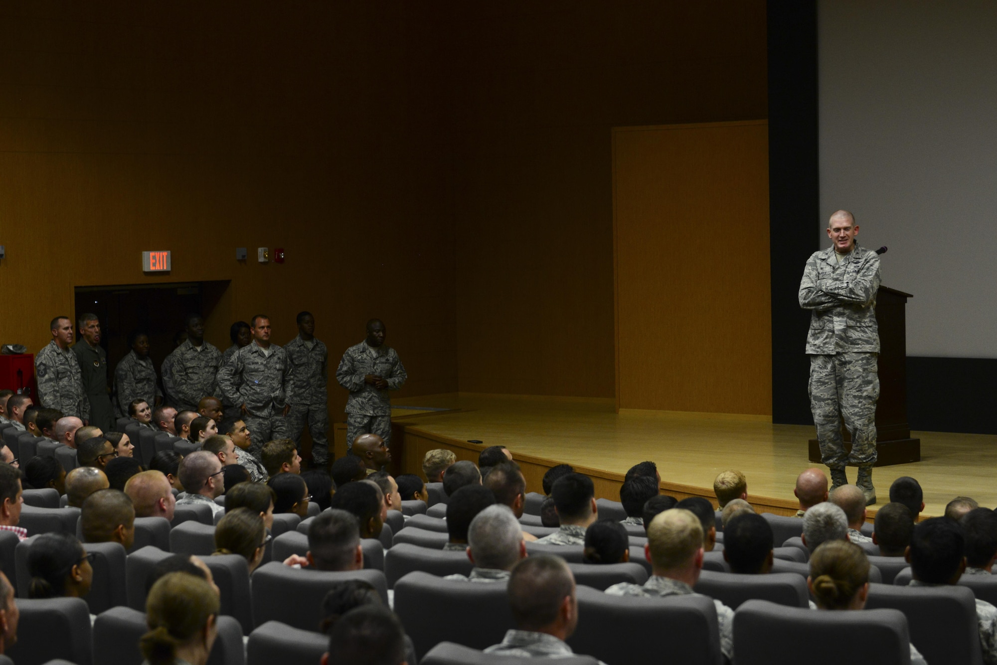U.S. Air Force Col. John Walker, 39th Air Base Wing commander, addresses wing personnel about recent conditions July 24, 2016, at Incirlik Air Base, Turkey. Walker expressed his gratitude for the hard work and dedication of the men and women serving at Incirlik. (U.S. Air Force photo by Tech. Sgt. Caleb Pierce) 