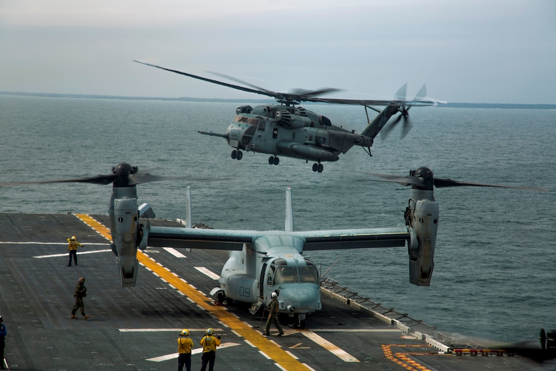 U.S. Marines and Sailors with Battalion Landing Team, 1st Battalion, 6th Marine Regiment (BLT 1/6), 22nd Marine Expeditionary Unit (MEU), simulate launching a heavy package aviation raid with Marine Medium Tiltrotor Squadron 264 (Reinforced), 22nd MEU, from the USS Wasp on Mar. 19, 2016. The 22nd MEU and Amphibious Squadron Six (PHIBRON-6) are underway for PHIBRON/MEU Integration Training. 
