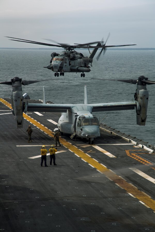 U.S. Marines and Sailors with Battalion Landing Team, 1st Battalion, 6th Marine Regiment (BLT 1/6), 22nd Marine Expeditionary Unit (MEU), simulate launching a heavy package aviation raid with Marine Medium Tiltrotor Squadron 264 (Reinforced), 22nd MEU, from the USS Wasp on Mar. 19, 2016. The 22nd MEU and Amphibious Squadron Six (PHIBRON-6) are underway for PHIBRON/MEU Integration Training. (U.S. Marine Corps photo by Cpl. Ryan G. Coleman / 22 Marine Expeditionary Unit/ Released) 