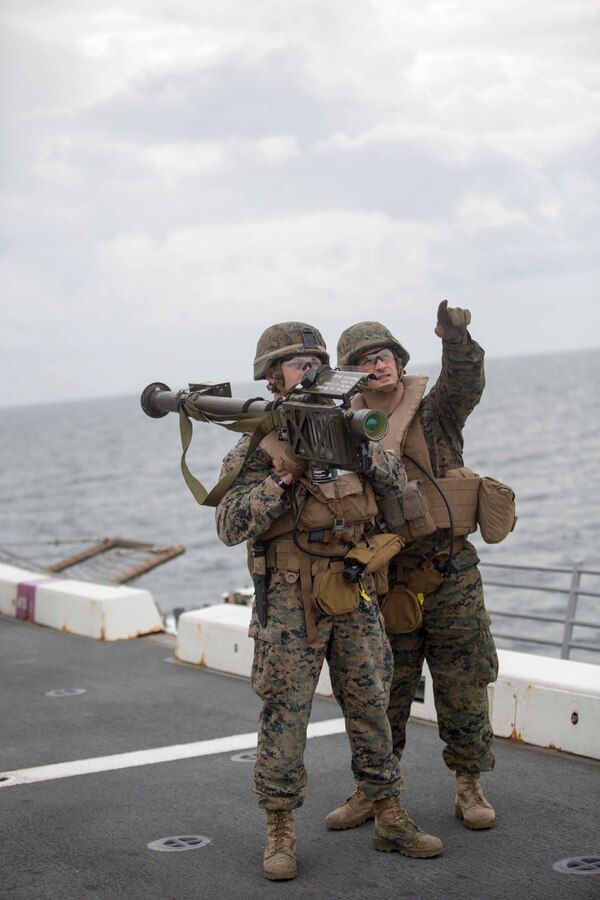 U.S. Marines Sgt. Ian Keyser and Cpl. Gregory Johnson, low-altitude air defense gunners with 2nd LAAD Detachment, Marine Medium Tiltrotor Squadron 264 (Reinforced), 22nd Marine Expeditionary Unit (MEU), track an unmanned aerial vehicle using a Stinger missile tracking and handling trainer aboard the USS San Antonio (LPD-17) March 19, 2016. The 22nd MEU and Amphibious Squadron Six (PHIBRON-6) are underway for PHIBRON/MEU Integration Training. 