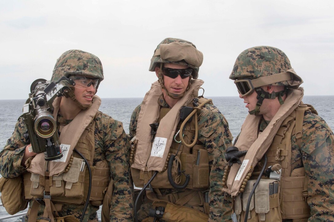 U.S. Marines (from left) Lance Cpl. Enrique Delavega, Cpl. Dakota Messier, low-altitude air defense gunners, and Cpl. Joseph Currey, an air support operations operator, with 2nd LAAD Detachment, Marine Medium Tiltrotor Squadron 264 (Reinforced), 22nd Marine Expeditionary Unit (MEU), track an unmanned aerial vehicle using a Stinger missile tracking and handling trainer aboard the USS San Antonio (LPD-17) March 19, 2016. The 22nd MEU and Amphibious Squadron Six (PHIBRON-6) are underway for PHIBRON/MEU Integration Training. 