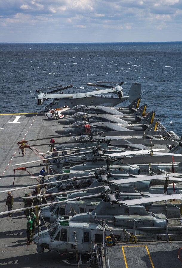 U.S. Marine aircraft with Marine Medium Tiltrotor Squadron 264 (Reinforced) 22nd Marine Expeditionary Unit (MEU) are secured to the flight deck of the USS Wasp March 21, 2016. The 22nd MEU and Amphibious Squadron Six (PHIBRON-6) are underway for PHIBRON/MEU Integration Training. 