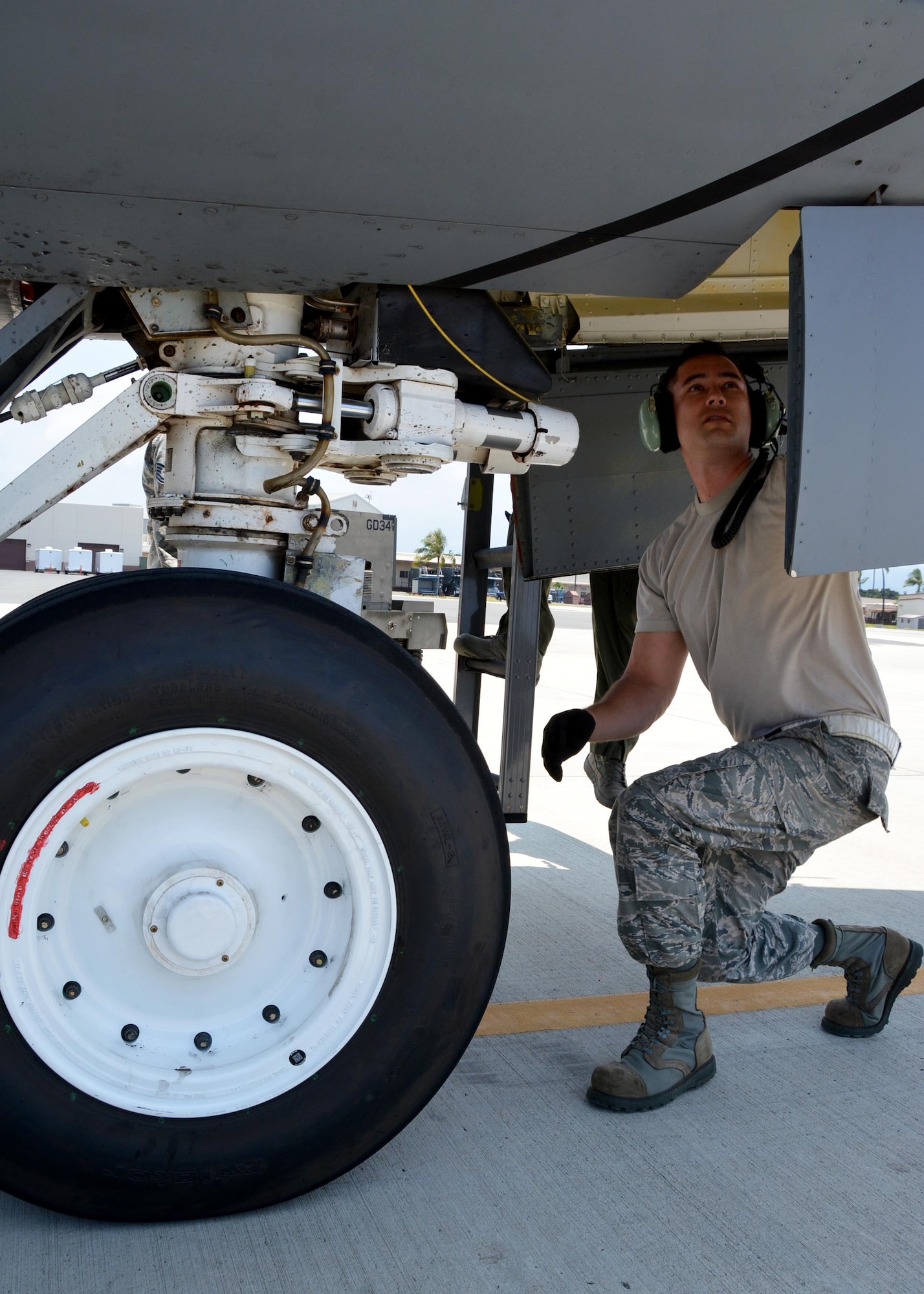 JOINT BASE PEARL HARBOR-HICKAM - Tech Sgt. Michael Dunning, crew chief with the 507th Aircraft Maintenance Squadron at Tinker Air Force Base, Okla., performs a nose landing gear inspection following an aerial refueling mission as part of Rim of the Pacific 2016. Twenty-six nations, more than 40 ships and submarines, more than 200 aircraft, and 25,000 personnel are participating in RIMPAC from June 30 to Aug. 4, in and around the Hawaiian Islands and Southern California. (U.S. Air Force photo\Tech. Sgt. Lauren Gleason)
