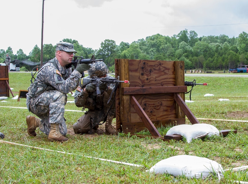 Task Force Wolf, Army Reserve instructor Staff Sgt. Tyler Martin instructs Frantz Pierre, a Cadet Initial Entry Training (CIET) candidate from Marion Military Institute in Northern Alabama, on the Individual Movement Training (IMT) lane at Christensen Range, during Cadet Summer Training (CST16), at Ft. Knox, Kentucky, July 11. (U.S. Army Reserve photo by Sgt. Karen Sampson/ Released)