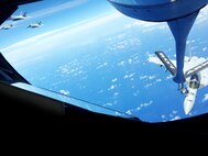 JOINT BASE PEARL HARBOR-HICKAM - A U.S. Navy F-18 Hornet receives fuel from a KC-135R Stratotanker from the 465th Air Refueling Squadron, Tinker Air Force Base, Okla., while three more jets await refueling as part of Rim of the Pacific 2016. Twenty-six nations, more than 40 ships and submarines, more than 200 aircraft, and 25,000 personnel are participating in RIMPAC from June 30 to Aug. 4, in and around the Hawaiian Islands and Southern California. The world's largest international maritime exercise, RIMPAC provides a unique training opportunity that helps participants foster and sustain the cooperative relationships that are critical to ensuring the safety of sea lanes and security on the world's oceans. RIMPAC 2016 is the 25th exercise in the series that began in 1971. (U.S. Air Force photo by Tech. Sgt. Lauren Gleason)