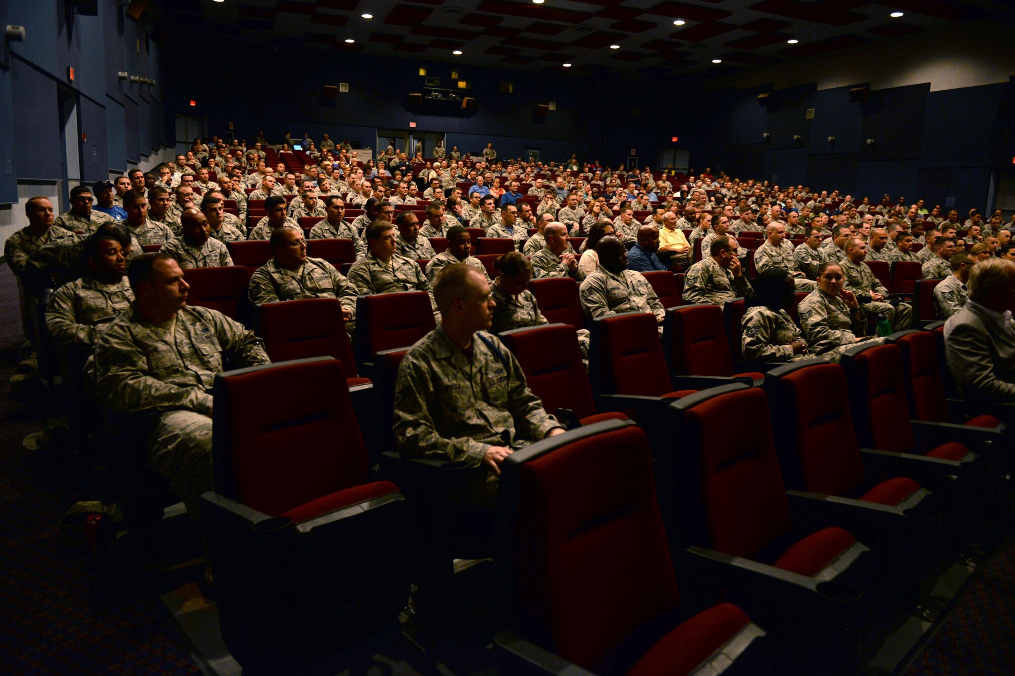 Airmen attend a Dan Clark leadership seminar at Sheppard Air Force Base, Texas, July 22, 2016. Clark, a well renowned author, songwriter and motivational speaker, shared his leadership experience with the base and local community. (U.S. Air Force photo by Senior Airman Kyle E. Gese/Released)