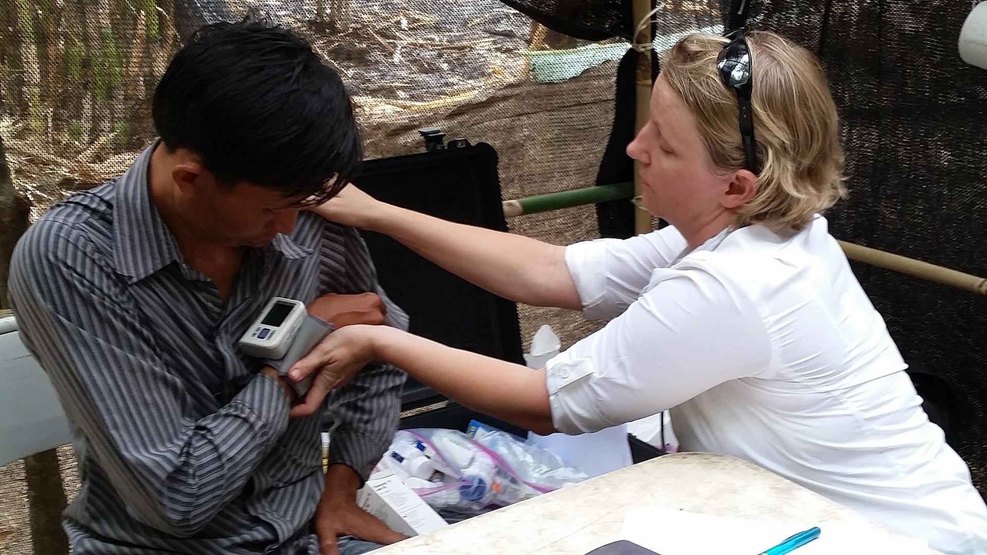 ATTAPEU PROVINCE, Laos – U.S. Army Maj. Tammie Kerns, the Defense POW/MIA Accounting Agency (DPAA) physician, meets with local of Attapeu Province, Lao People’s Democratic Republic, January 17, 2016, to better understand the available medical capabilities in the area during a routine DPAA mission. Members of DPAA deployed to the area in hopes of recovering the remains of two pilots unaccounted for from the Vietnam War. DPAA’s mission is to provide the fullest possible accounting for our missing personnel to their families and the nation. 