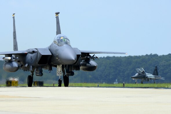 A U.S. Air Force F-15 Strike Eagle taxis on the flight line at Langley Air Force, Va., following a 95th Anniversary Maj. Gen. William “Billy” Mitchell memorial reenactment, July 22, 2016. Seven fighter wings, eight airframes and 33 aircrews from across the Air Force gathered to celebrate the 95th anniversary of the 1921 airpower trials. (U.S. Air Force photo by Staff Sgt. R. Alex Durbin)