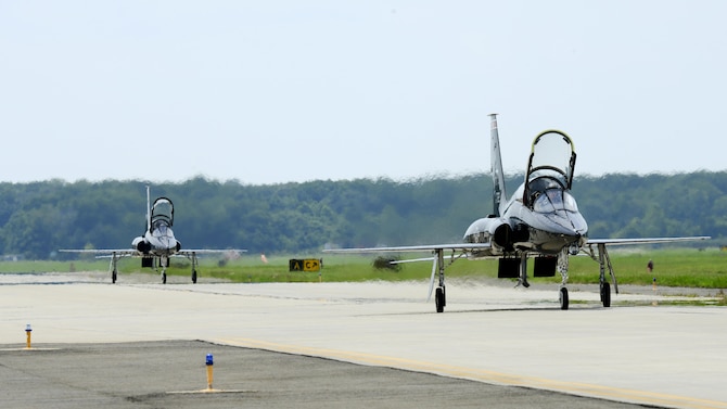 Two U.S. Air Force T-38 Talons taxi on the flight line at Langley Air Force Base, Va., following a 95th Anniversary Maj. Gen. William “Billy” Mitchell memorial reenactment, July 22, 2016. Seven fighter wings, eight airframes and 33 aircrews from across the Air Force gathered to celebrate the 95th anniversary of the 1921 airpower trials. (U.S. Air Force photo by Staff Sgt. R. Alex Durbin)