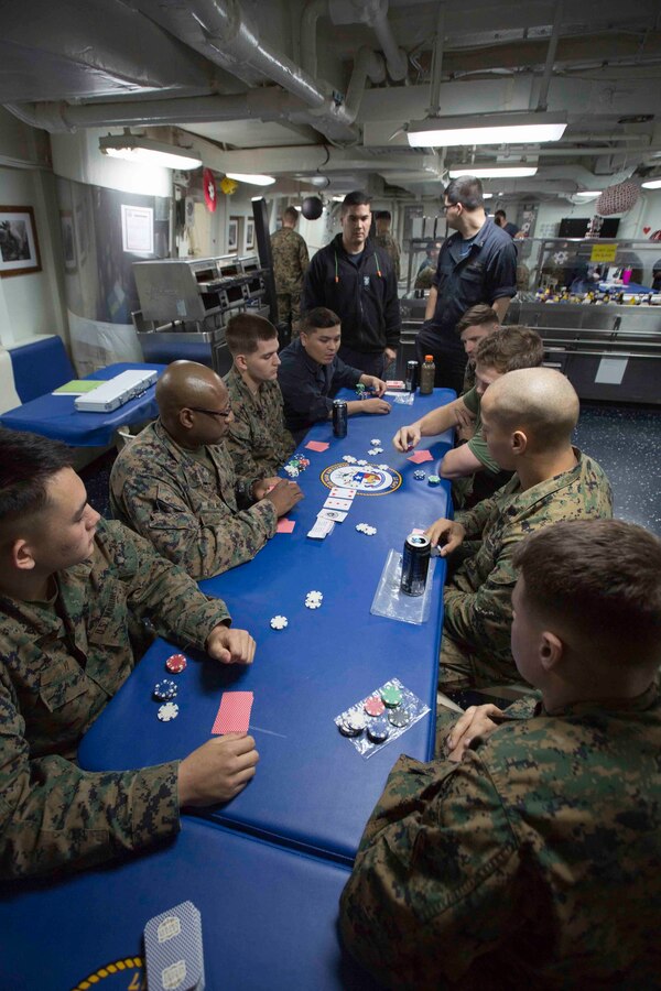 Marines and Sailors aboard the USS San Antonio (LPD-17) enjoyed a night of blackjack, poker and spades April 10, 2016. The servicemembers, from the 22nd Marine Expeditionary Unit and Amphibious Squadron Six (PHIBRON-6), are underway for Amphibious Ready Group/MEU exercises. 