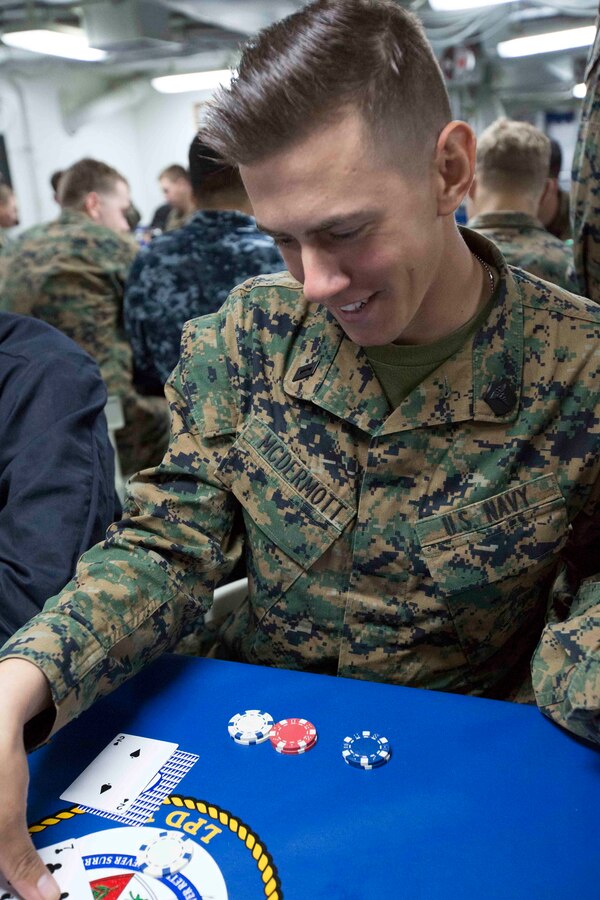 Marines and Sailors aboard the USS San Antonio (LPD-17) enjoyed a night of blackjack, poker and spades April 10, 2016. The servicemembers, from the 22nd Marine Expeditionary Unit and Amphibious Squadron Six (PHIBRON-6), are underway for Amphibious Ready Group/MEU exercises. 